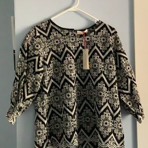 Solitaire never worn artisan crafted woman’s shirt. Size Large